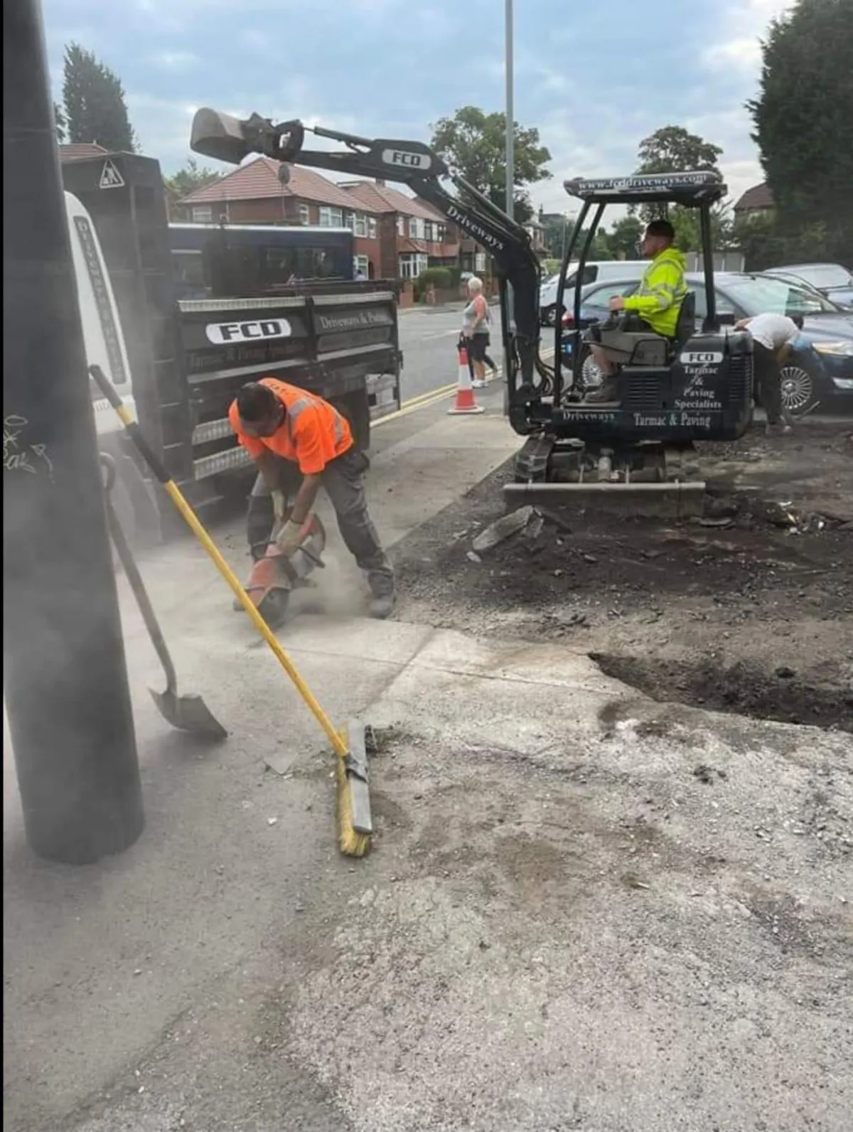 Rows of ripe tomatoes growing inside a greenhouse.