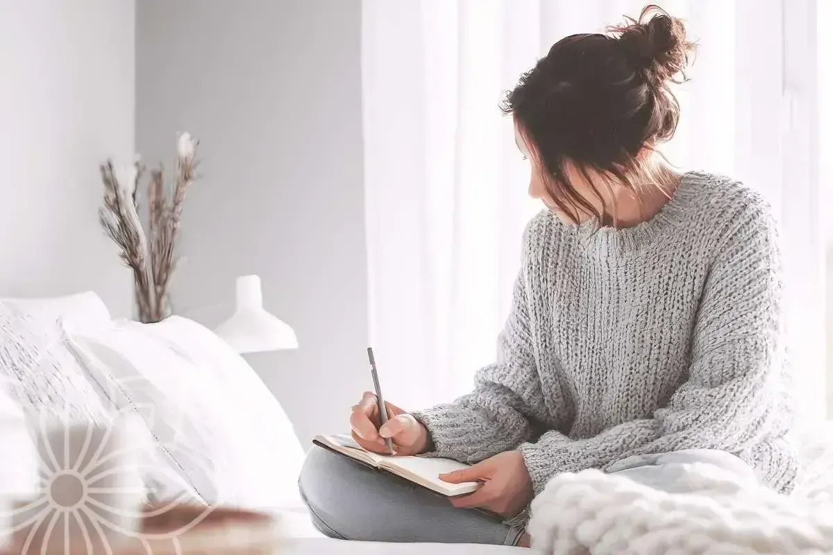 women journaling getting grounded and getting centered through Money Detox and Healing