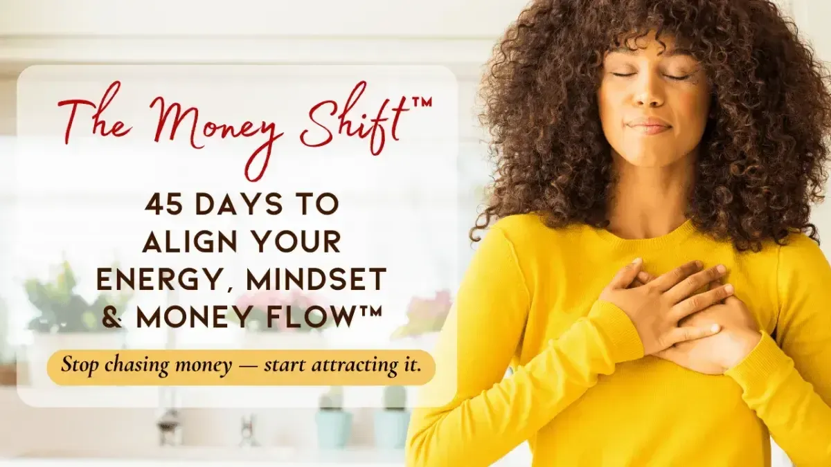 Woman with hands on heart and eyes closed, representing emotional grounding and aligned money mindset.