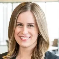 A woman with light brown hair gives a testimonial about Jillian's birth support as a doula. She had a positive, empowering birth.