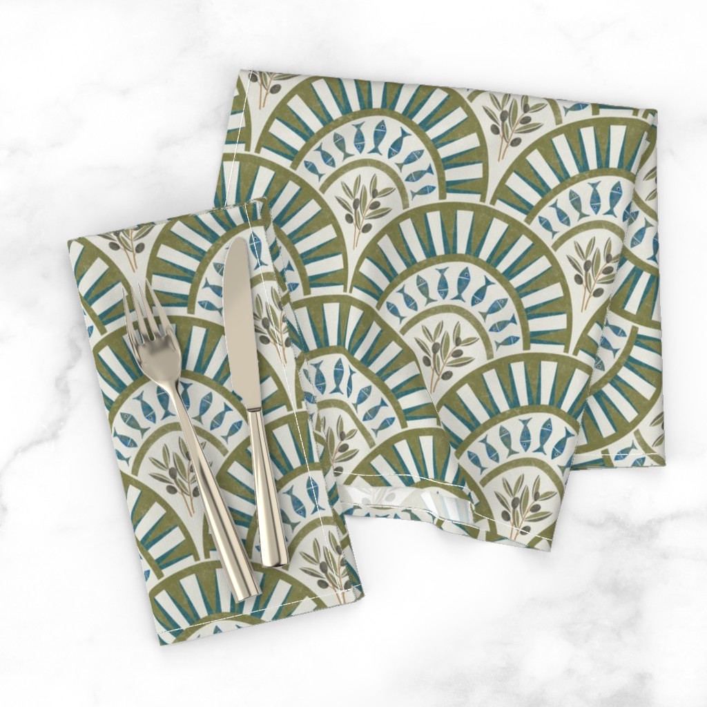 Mediterranean geometric arch print with muted olive and teal accents on cloth napkins, styled for layered dining decor.