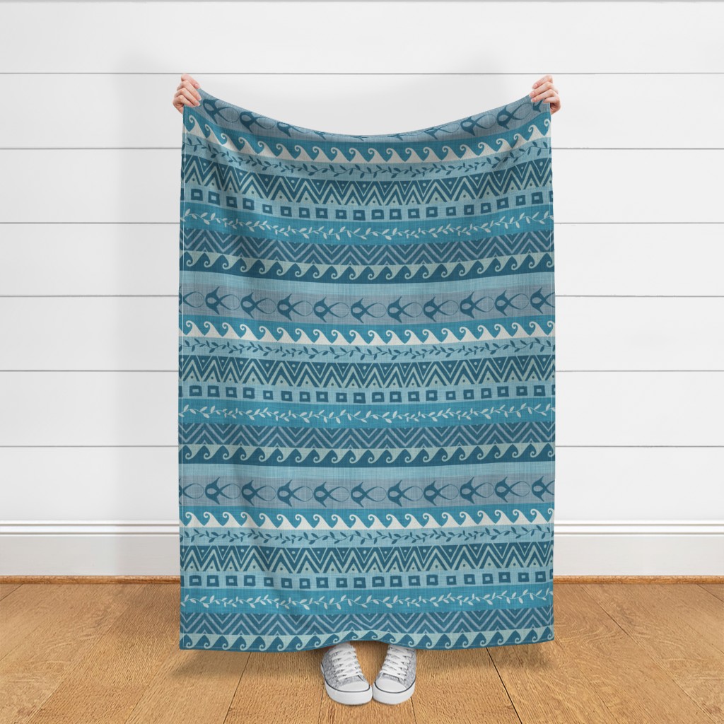 Muted teal and aqua boho coastal stripe fabric with ocean fish, wave borders, chevrons, and textured geometric bands.