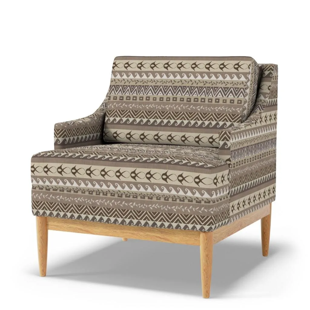 Muted taupe and cream geometric stripe upholstery adds a layered boho look to a modern armchair with natural wood legs.