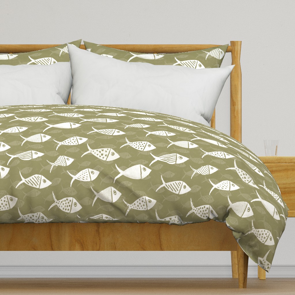 Olive green Nautical School of Fish shown on a duvet cover with white stylised fish and matching tonal fish details.