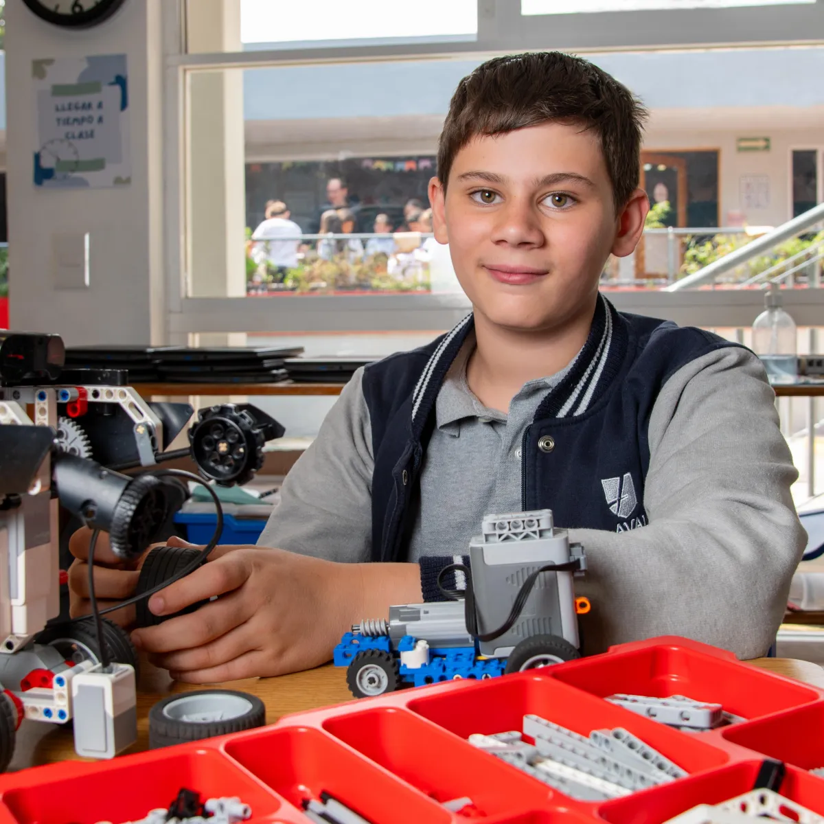 girl in pink and white floral dress riding on swing during daytime
