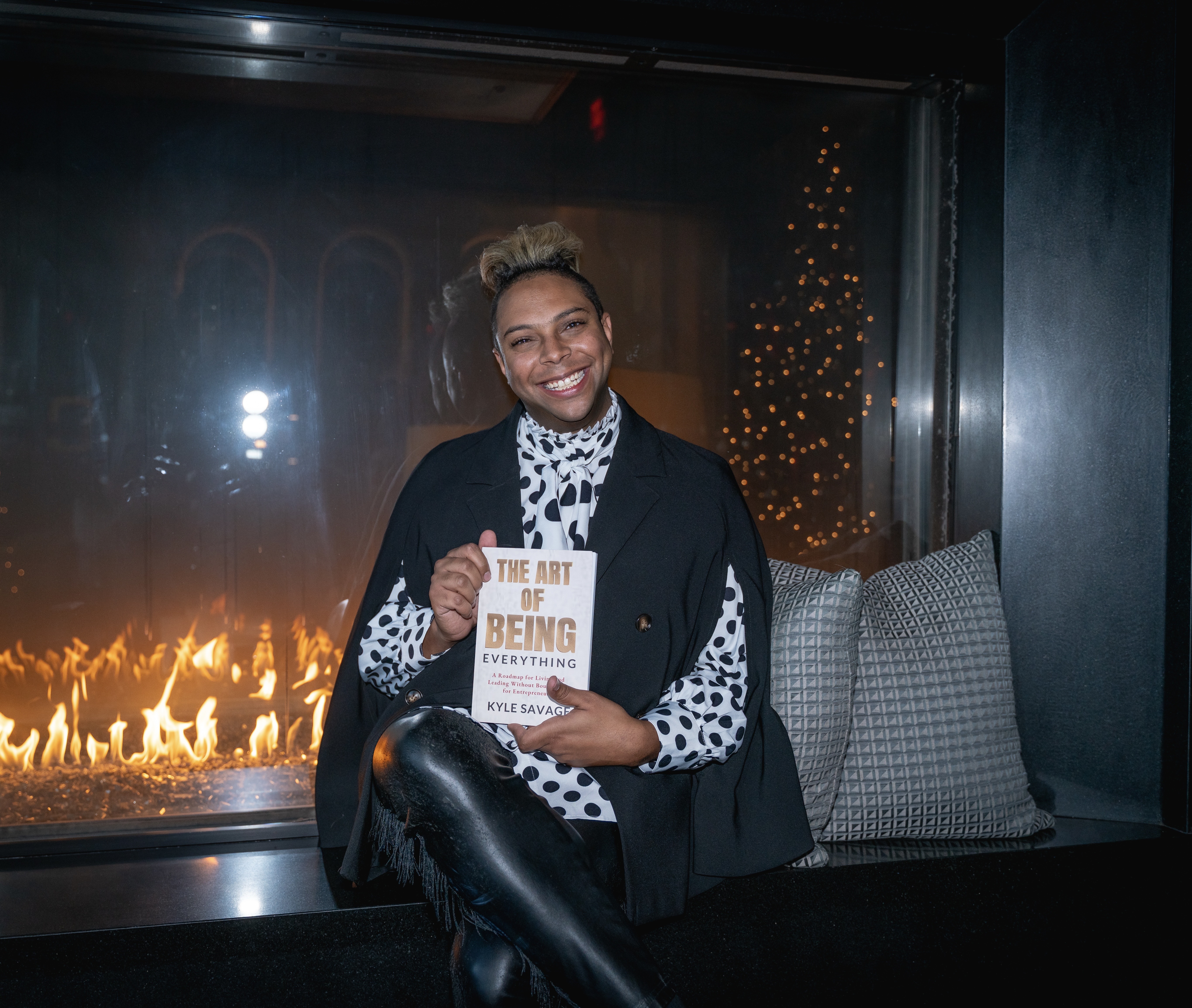A diverse group of professionals in a modern conference room, listening to a speaker with a cityscape view.
