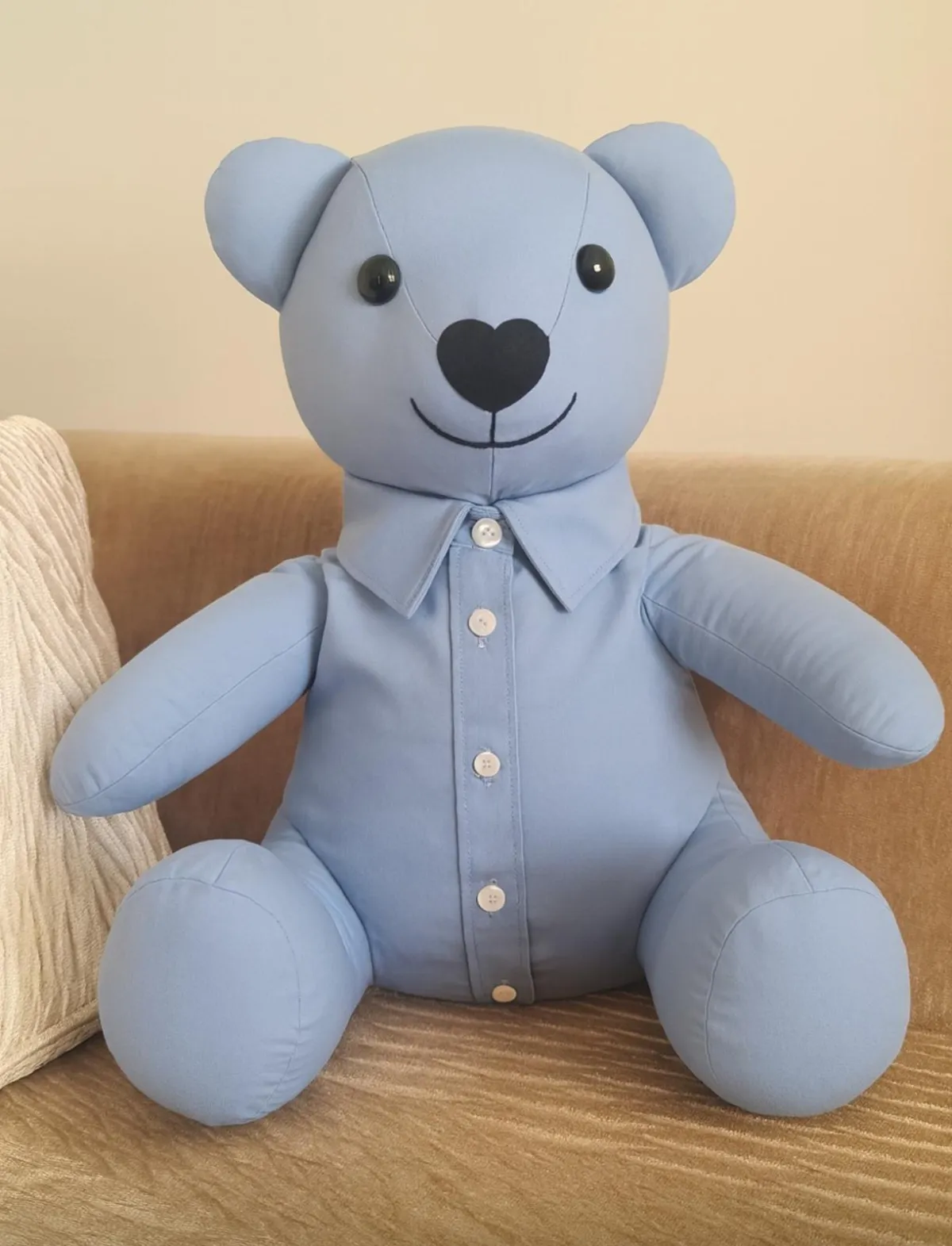 a woman in a red dress sitting next to a pile of presents