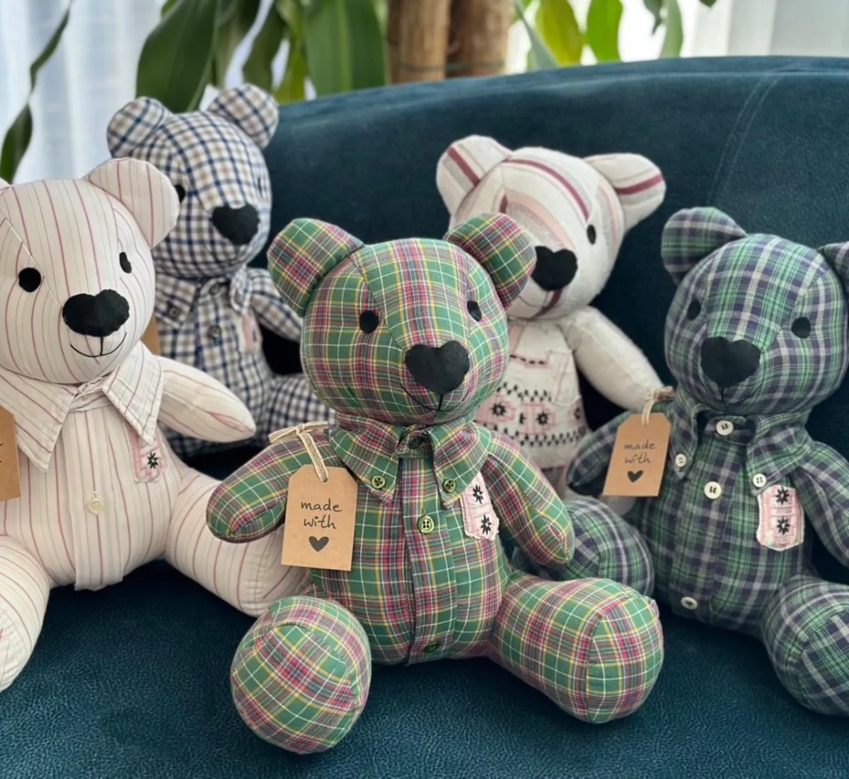 a woman in a red dress sitting next to a pile of presents