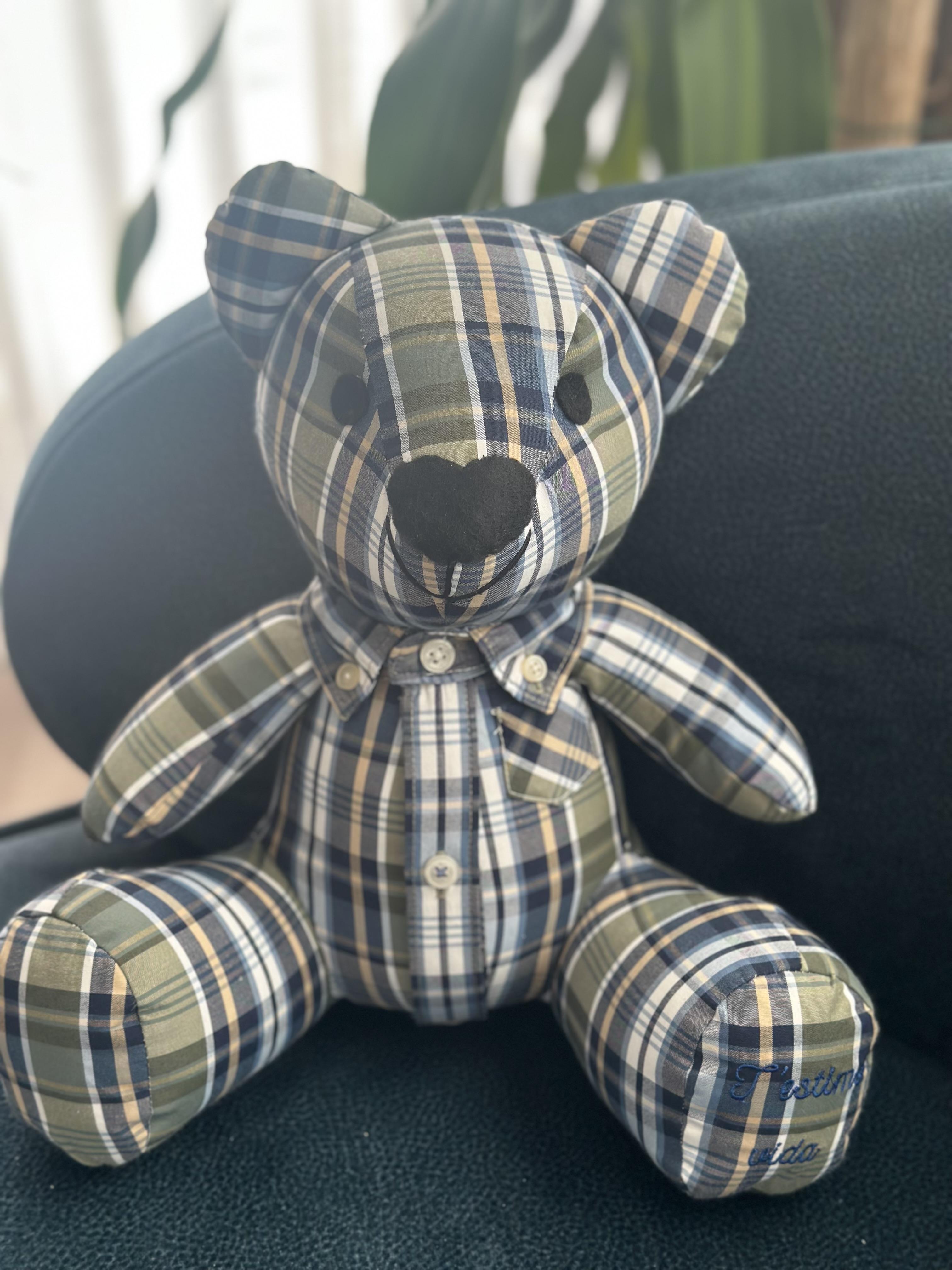 a woman in a red dress sitting next to a pile of presents
