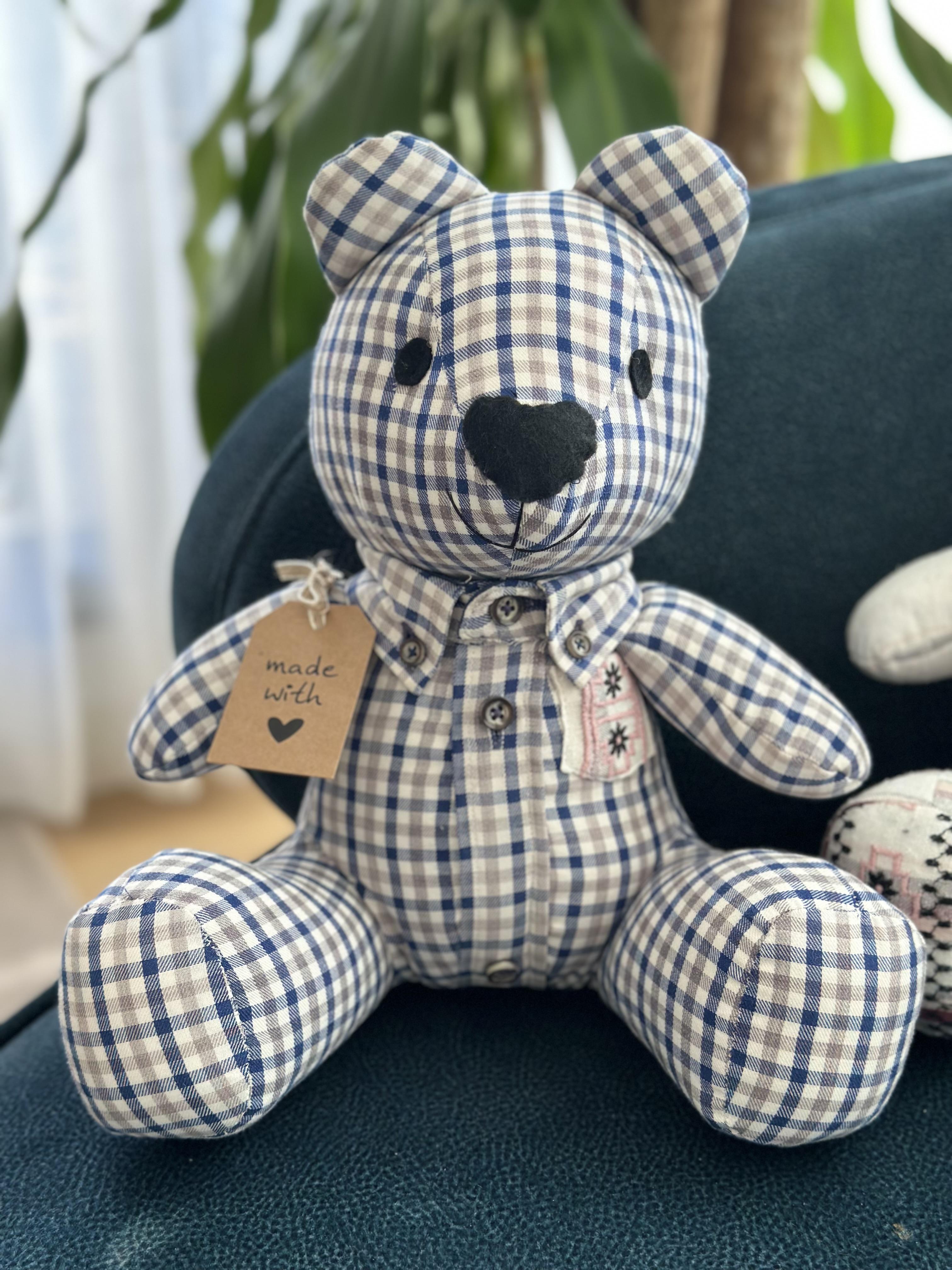 a woman in a red dress sitting next to a pile of presents