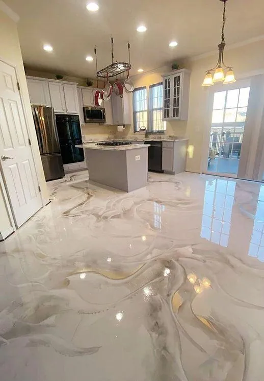 before and after epoxy flooring installation for residential garage in Evergreen