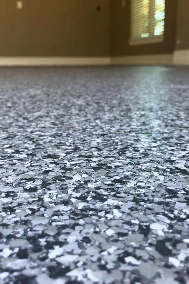 Evergreen Epoxy Flooring Company team installing floor in local Evergreen business