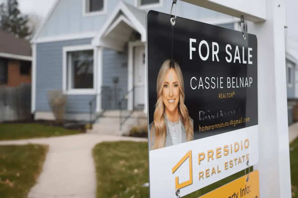 House for sale with realtor sign