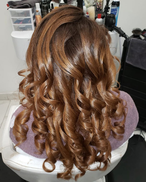 Copper highlights at secrets beauty salon and sp