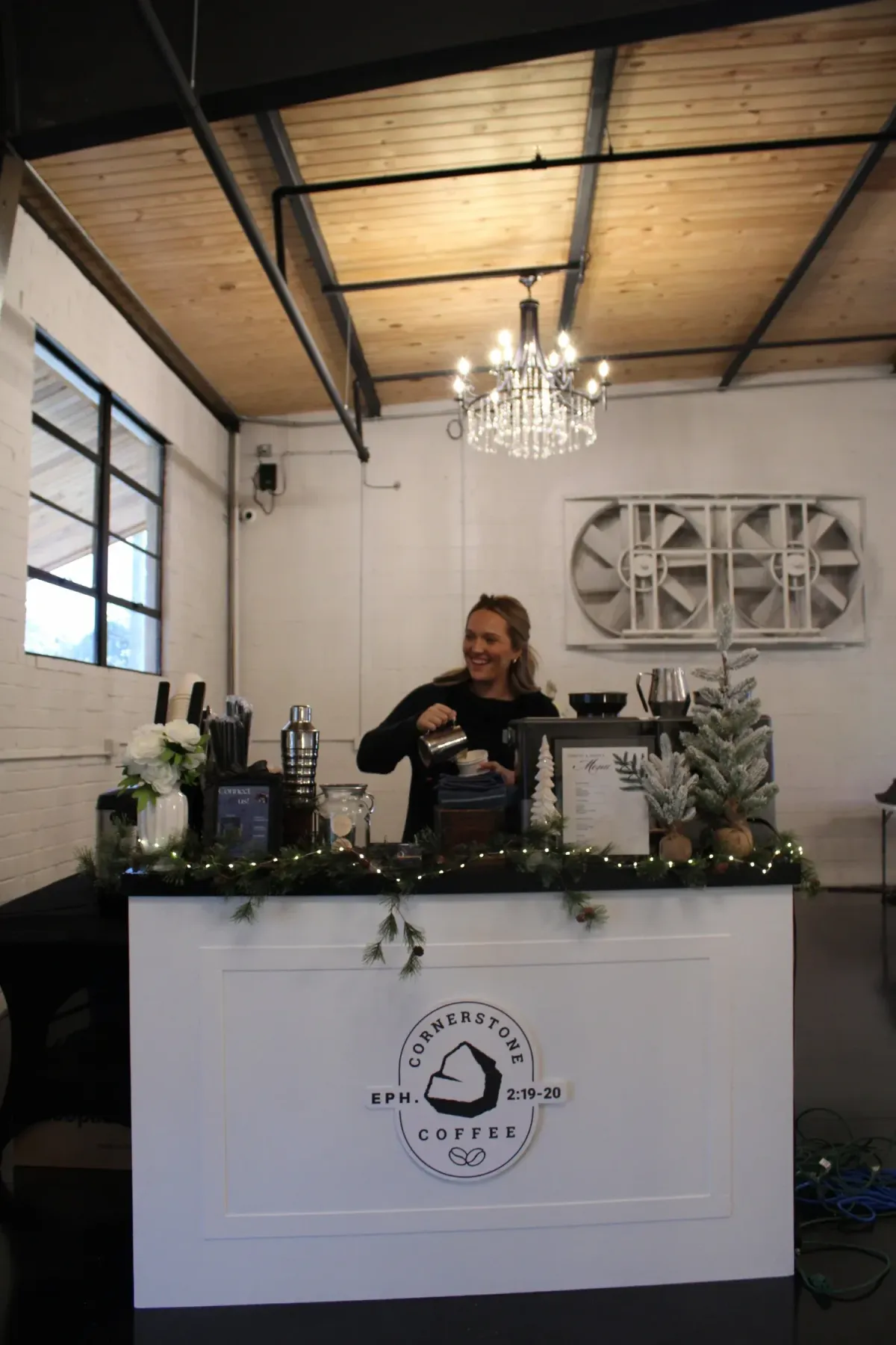 barista serving coffee in georgia