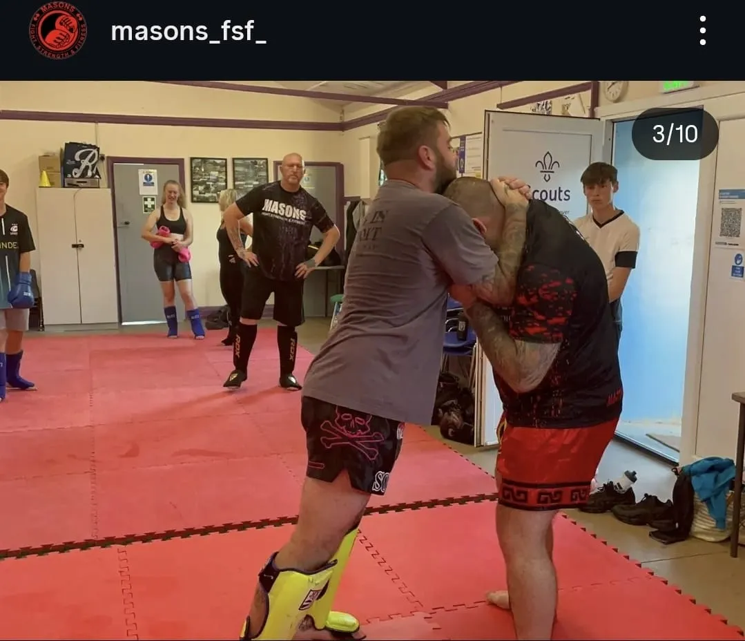 Combat sport founder high-angle ring training session