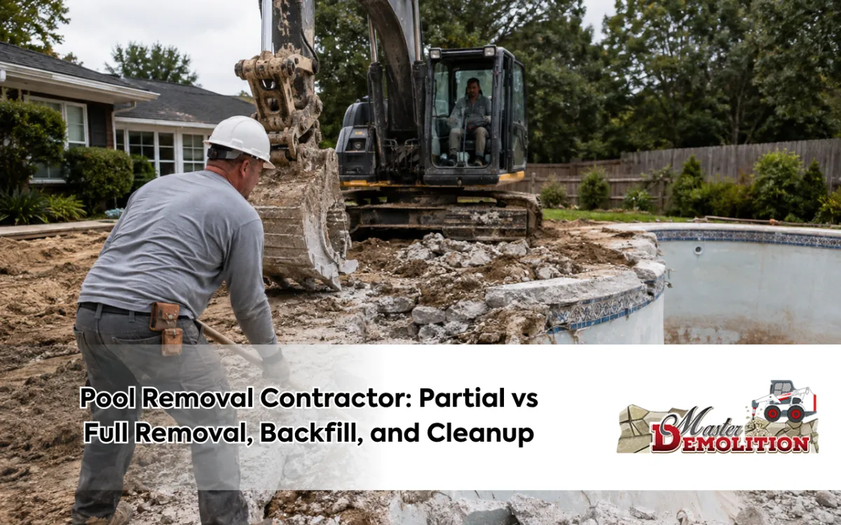 Pool removal contractor demolishing a residential swimming pool