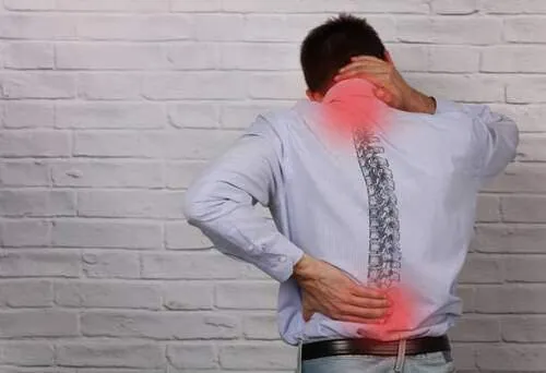 A man with misaligned spine