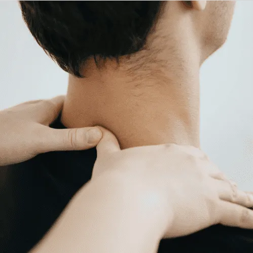 Chiropractor helping a patient relieve pain