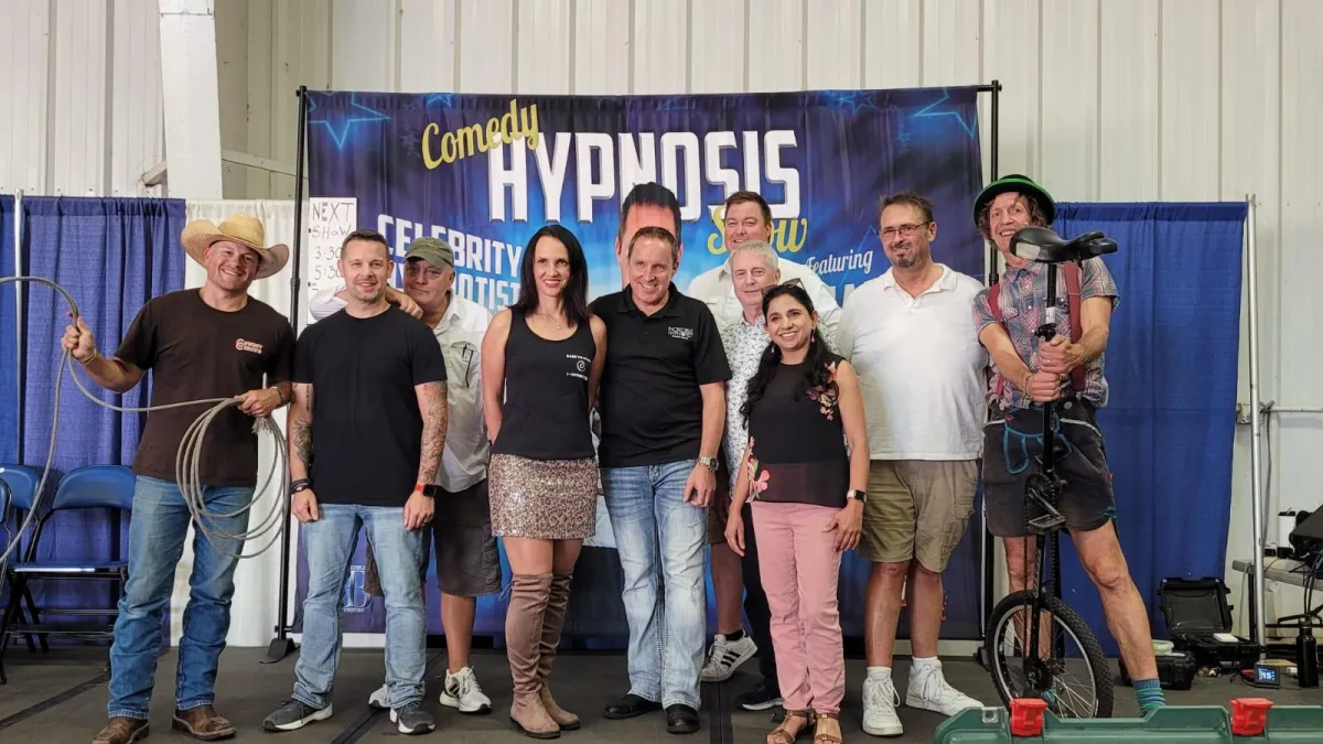 Richard Barker performing a corporate comedy hypnosis show in the UK