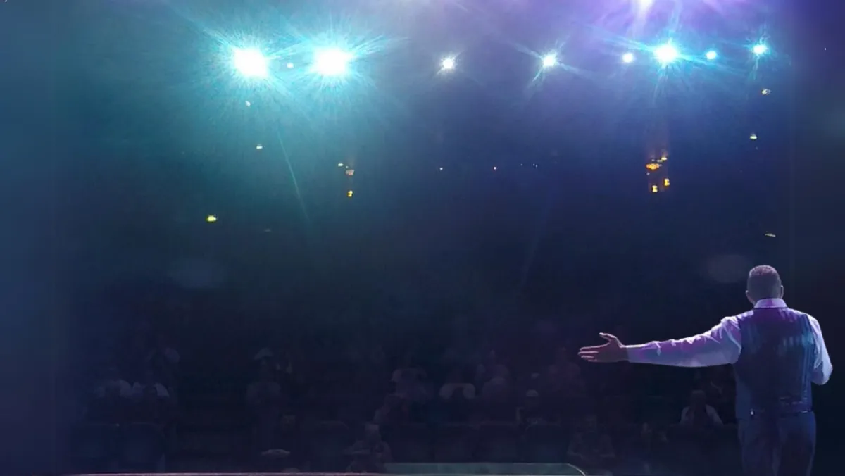 Richard Barker performing a corporate comedy hypnosis show in the UK