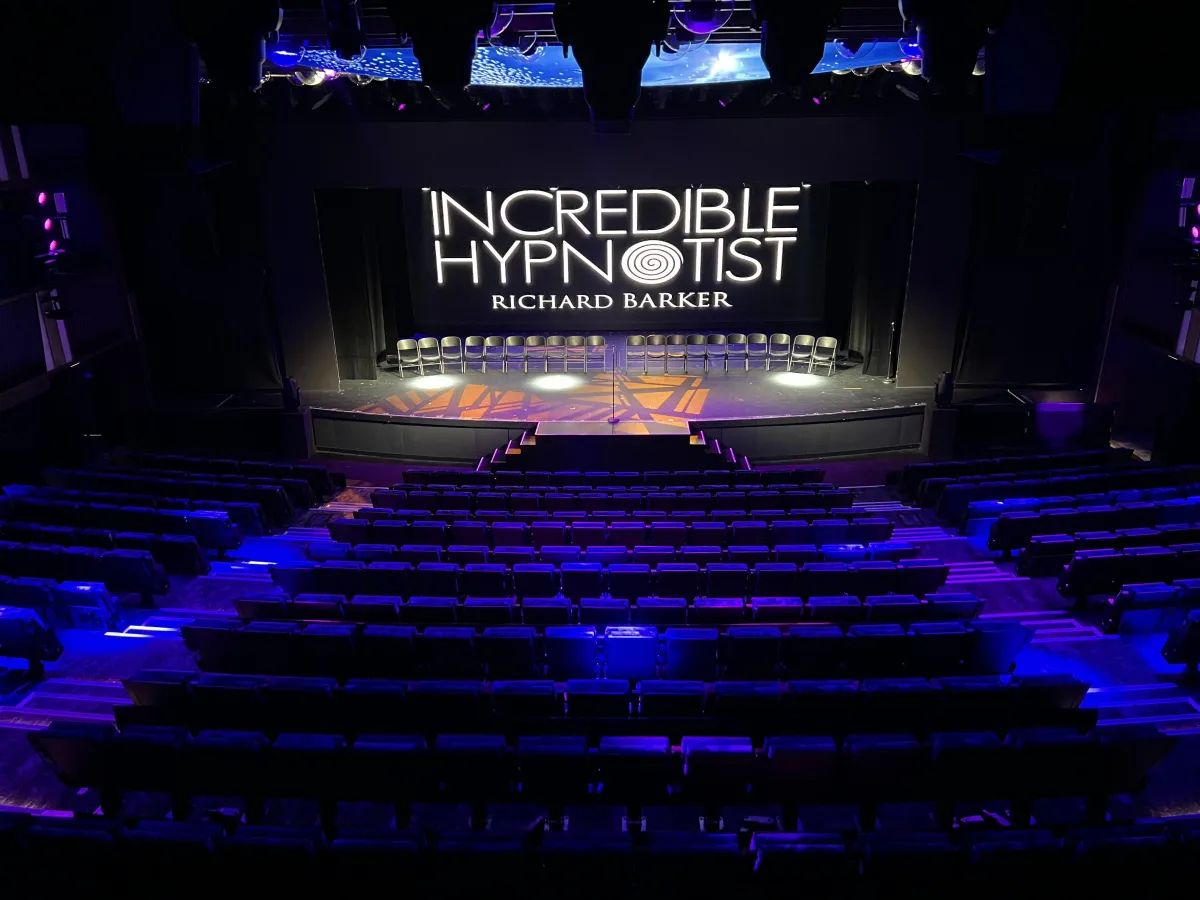 Richard Barker performing a corporate comedy hypnosis show in the UK