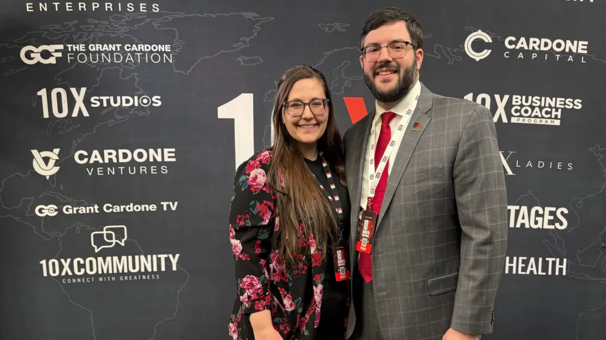 brown wooden sticks on sea during sunset