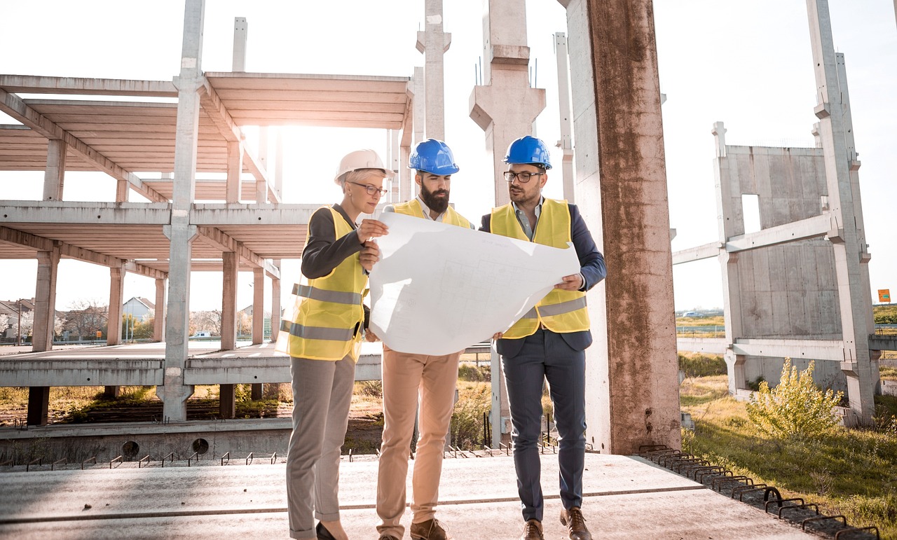 construction-workers-reviewing-the-project-buget