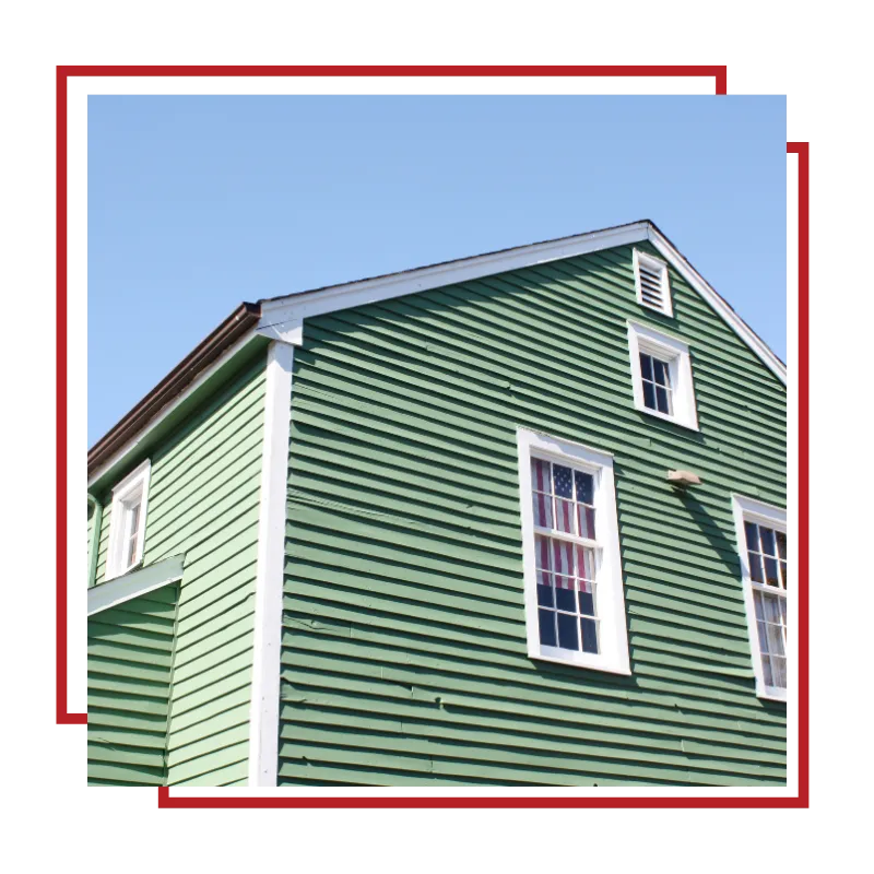 Homeowner reviewing siding consultation options for a property in Plymouth, MA
