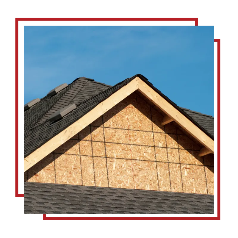 Licensed roofing team working on a roof replacement project in Plymouth, MA