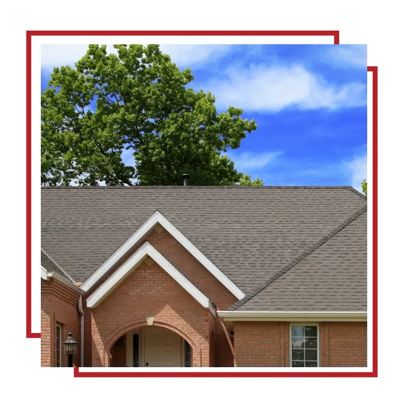 Roofing team working carefully on a home exterior project