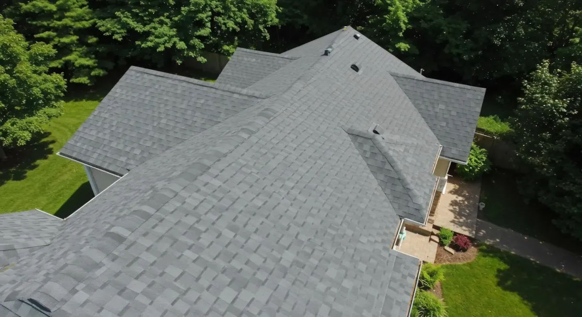 aerial view of a residential roof with high-quality gray asphalt shingles