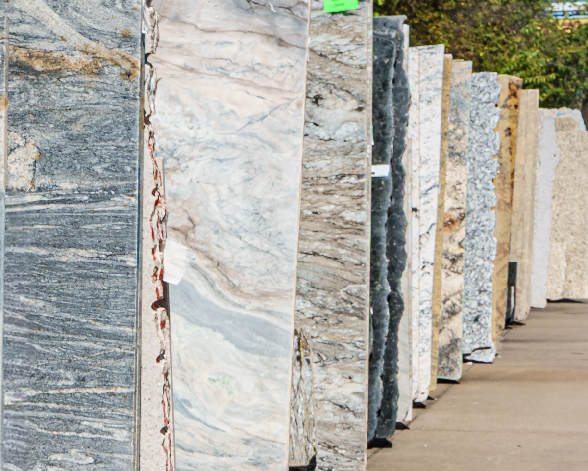 the Quality First team measuring a marble slab