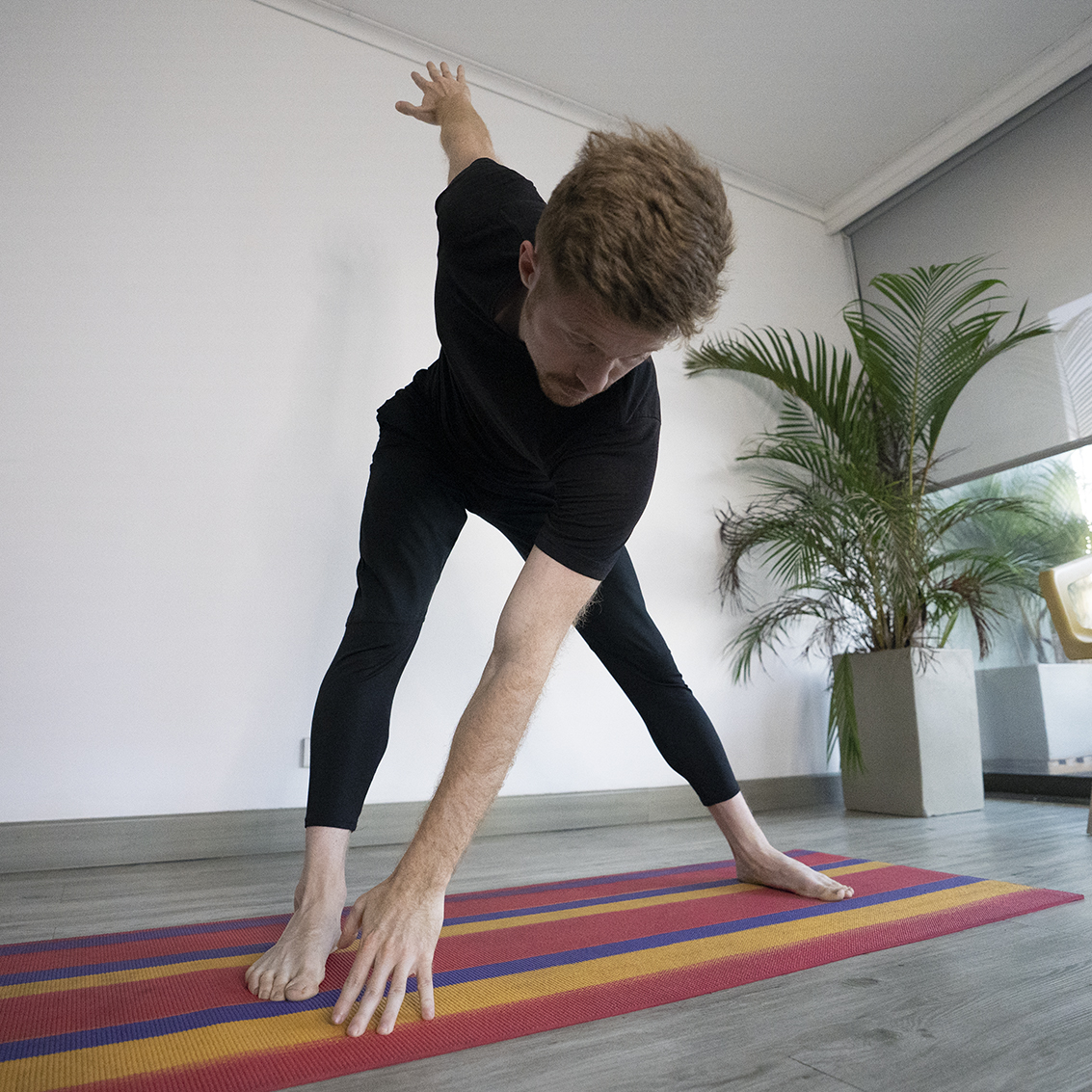 Instructor demonstrating a mobility movement (replace with real photo)