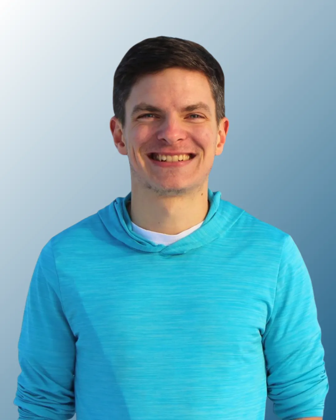 Portrait of a smiling sports nutritionist, mid-30s, wearing a white lab coat and holding a clipboard, standing in a modern gym, natural light, 1:1 aspect ratio