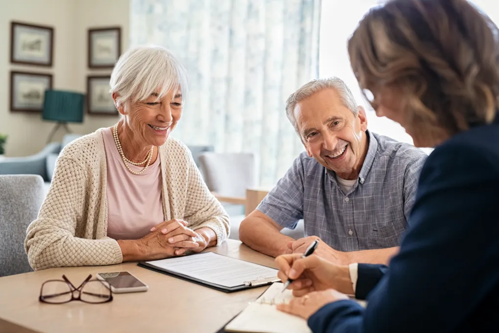 Care planning session with elderly couple