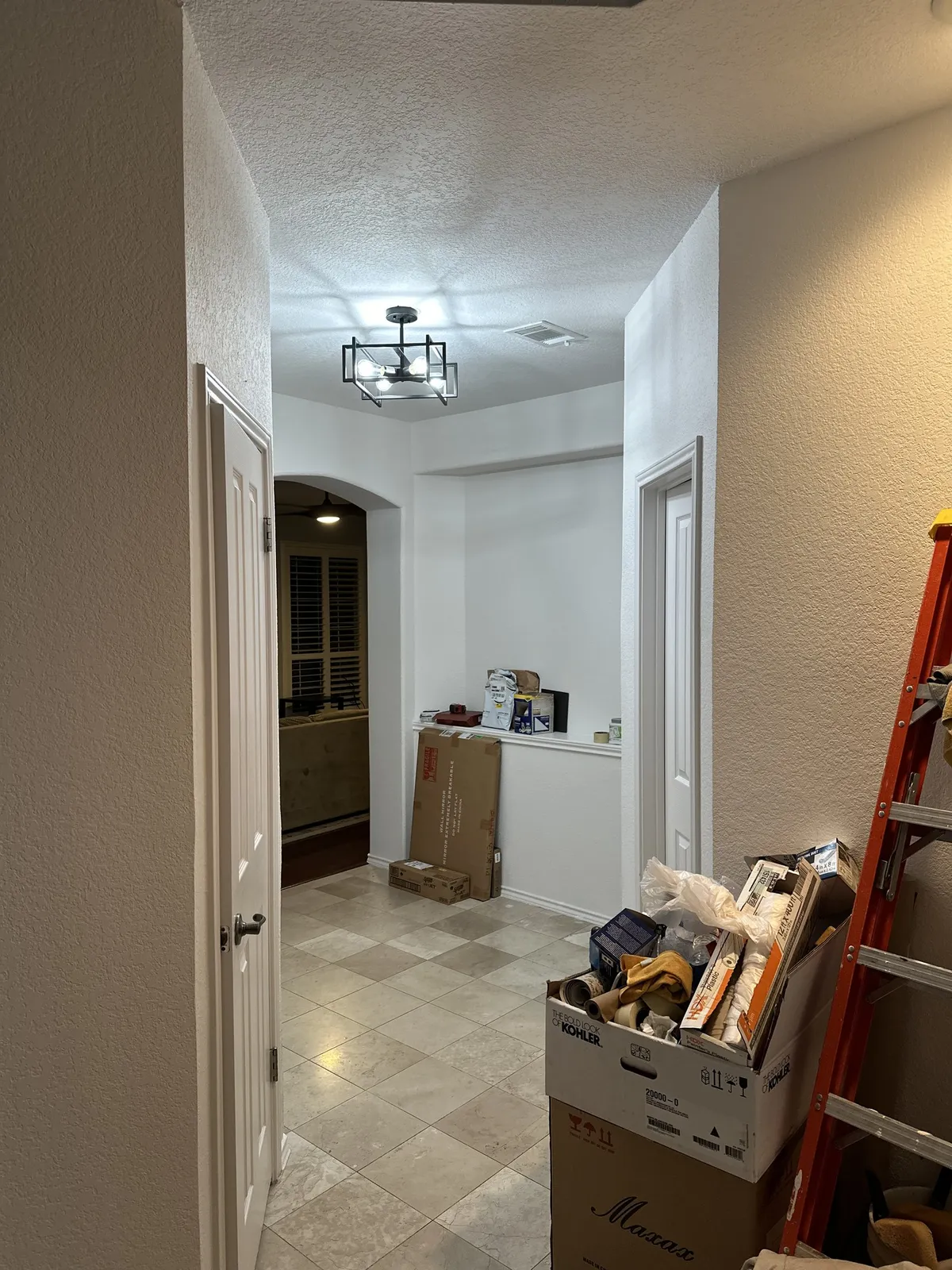Hallway painting with crisp white trim in San Antonio, TX 78248