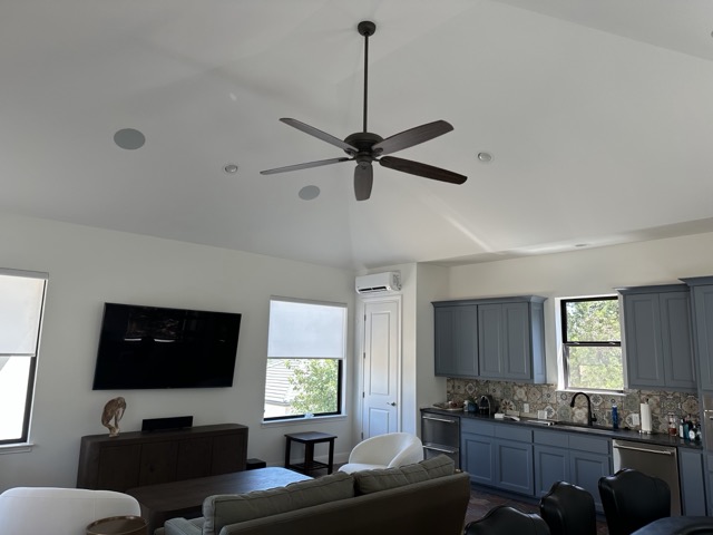 Living room with vaulted ceiling retaped, floated, and repainted by Easy Peasy Painting in northwest San Antonio, TX