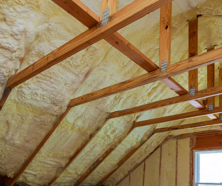 Spray foam insulation on attic ceiling