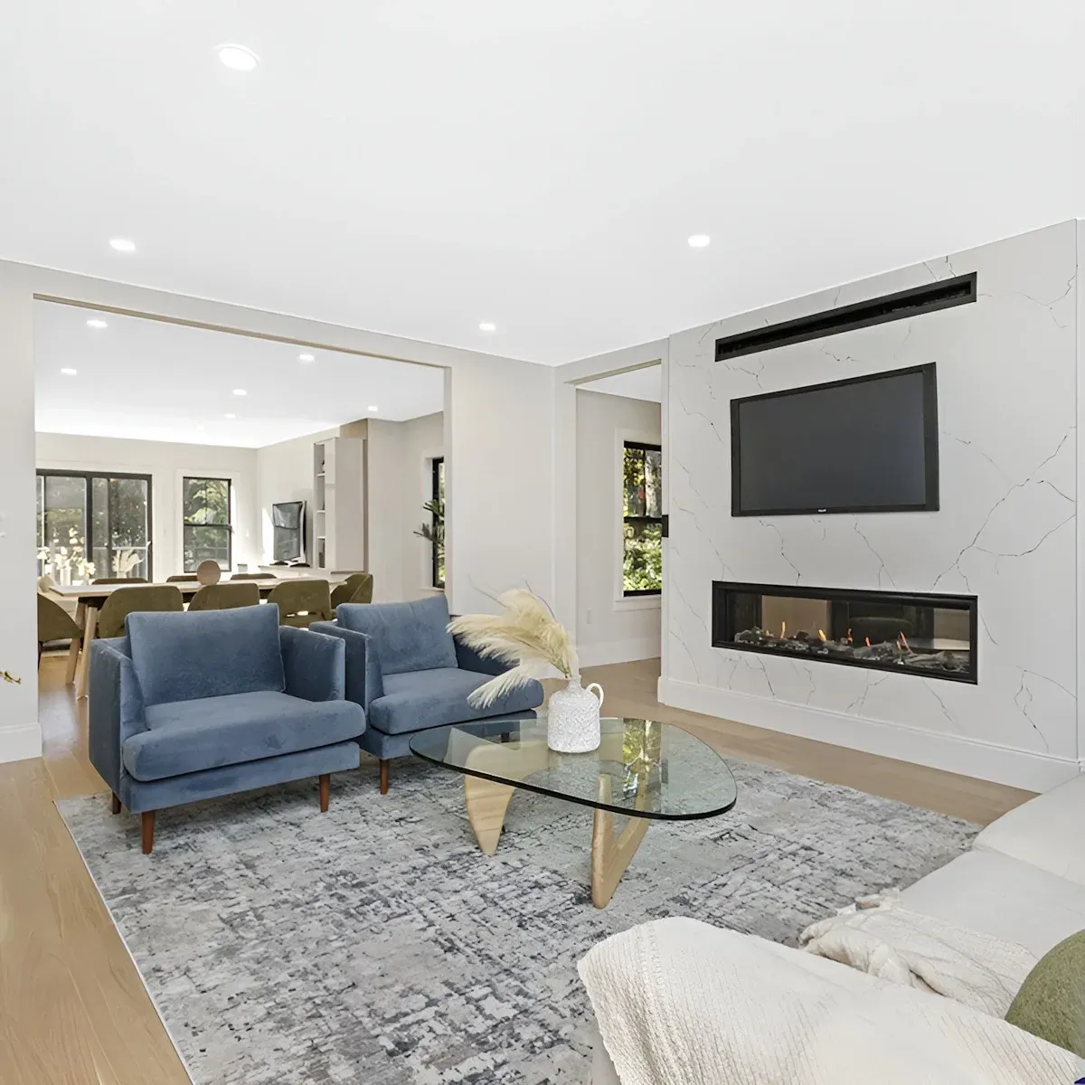 Completed modern home remodel in Vista CA featuring sleek hardwood floors open living space stylish decor upgraded kitchen natural light neutral tones