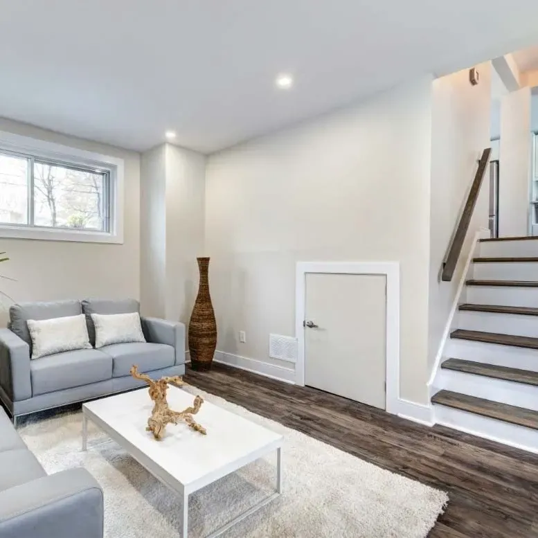 Completed modern home remodel in Vista CA featuring sleek hardwood floors open living space stylish decor upgraded kitchen natural light neutral tones