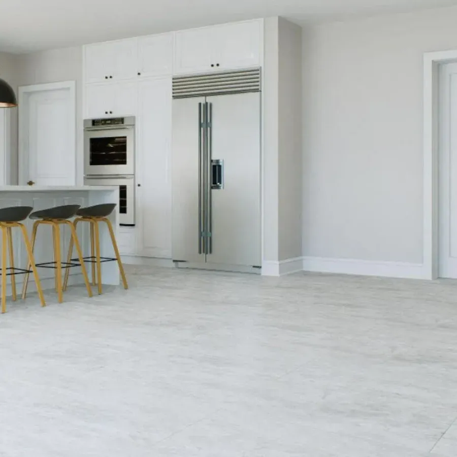 Freshly installed hardwood kitchen flooring in Vista California featuring warm tones, natural grain, and seamless texture