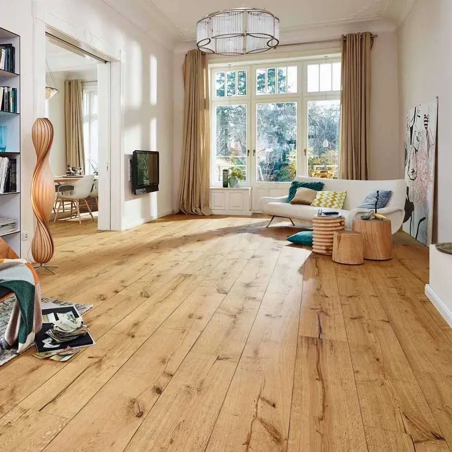 Pristine laminate flooring with detailed wood grain, seamless installation, in a modern bright room with natural light in Vista CA