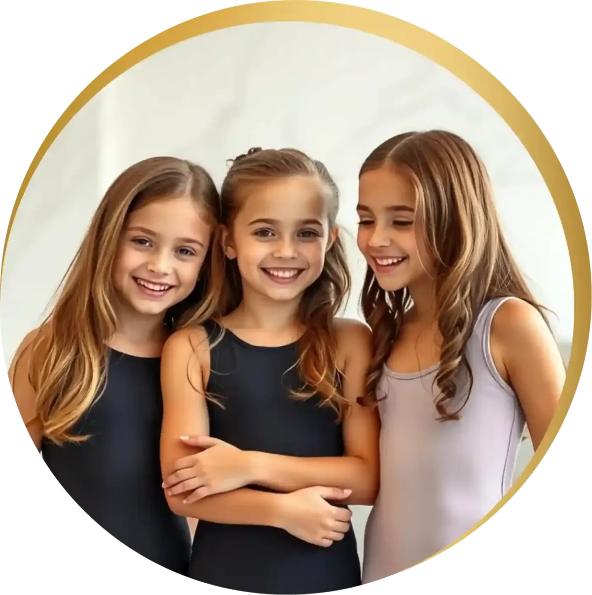 Three smiling girls in StrongGirls leotards hugging each other, showing close friendship and support in gymnastics