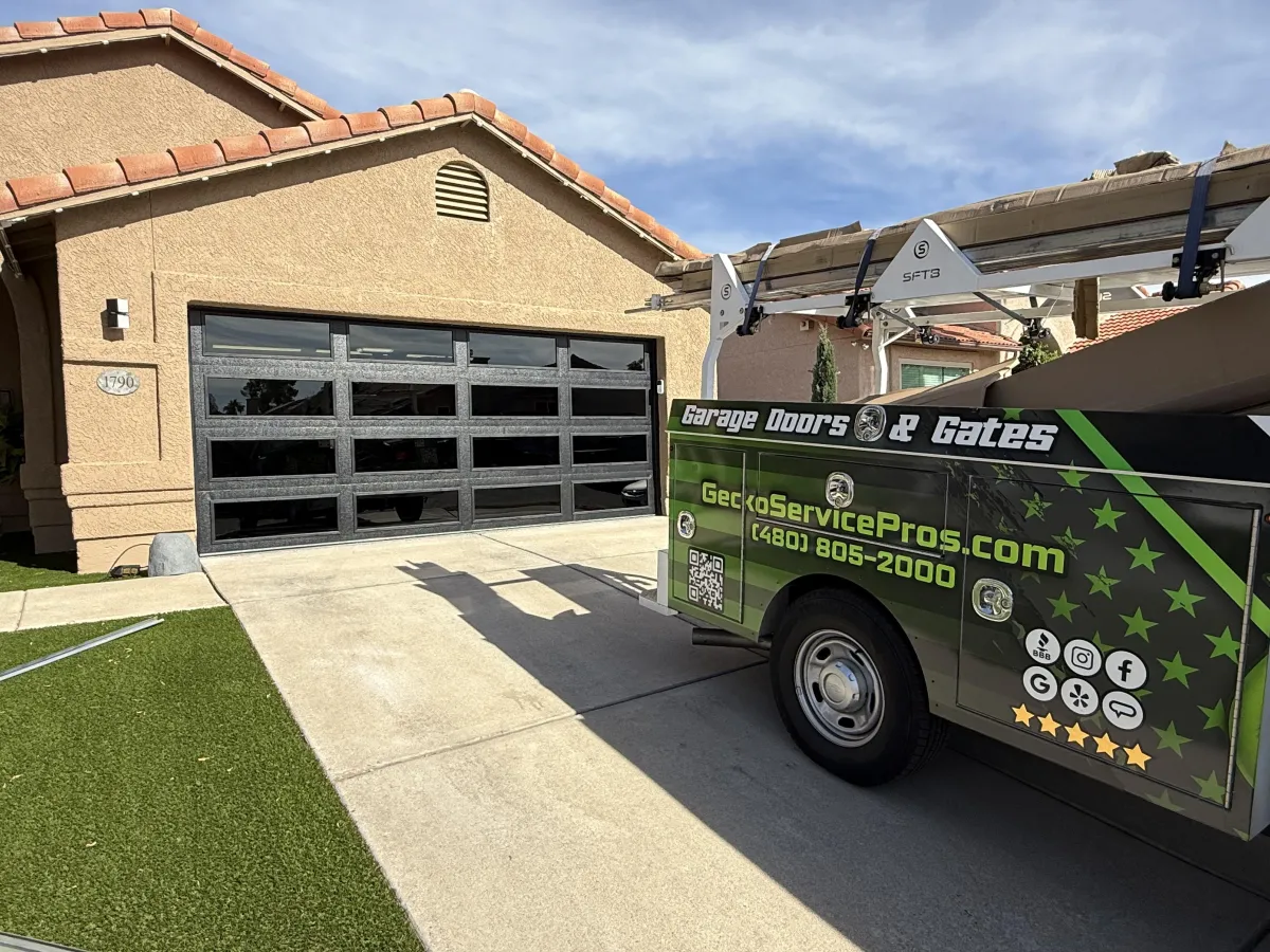 Modern parking garage entrance with white spiral staircase