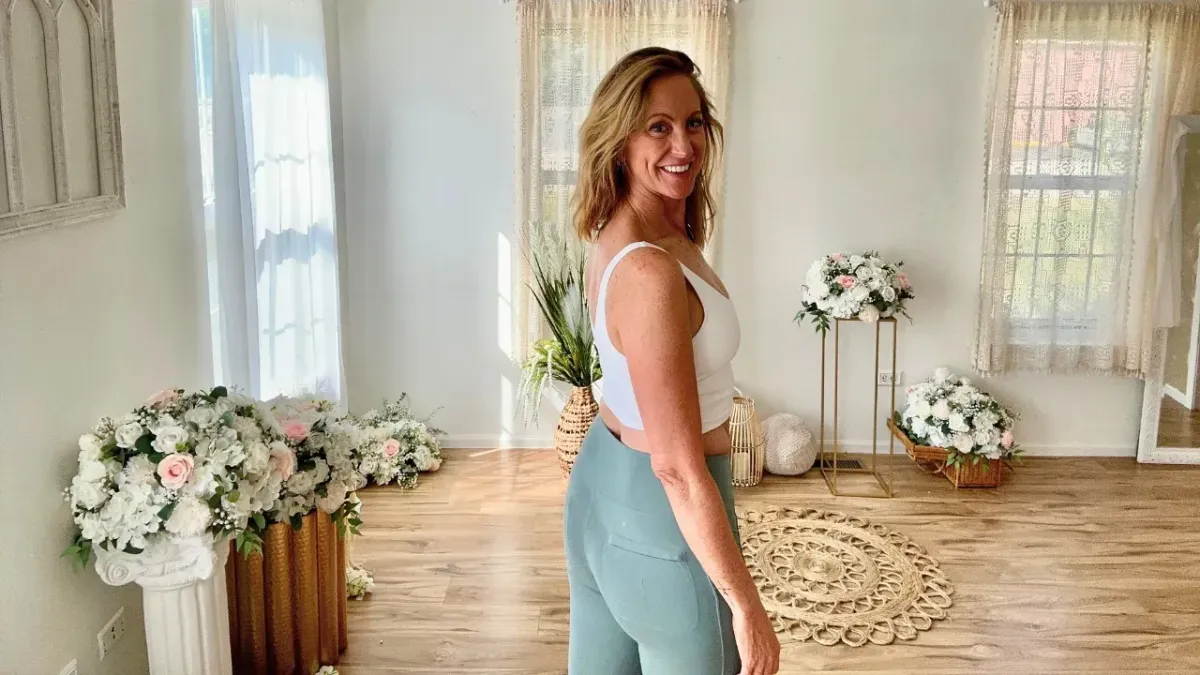 Kate Ryan in a calm movement and meditation space (intentionality-course.webp)