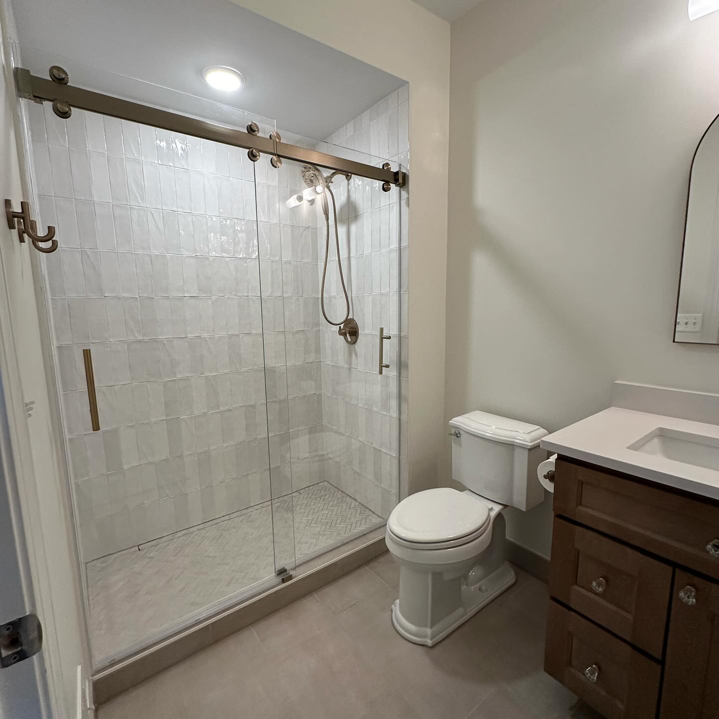 Luxury bathroom remodel with new tile and fixtures