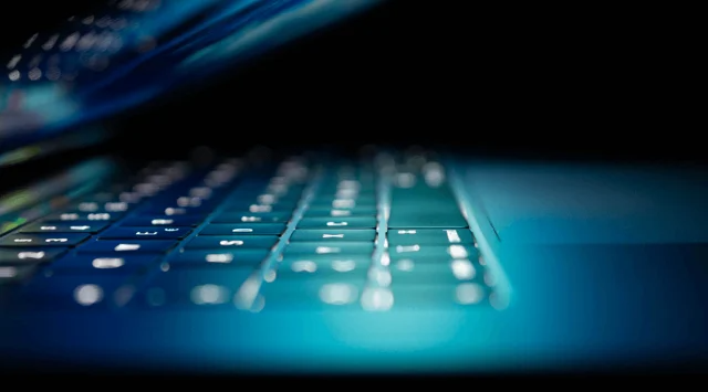 Glowing keyboard image reflects the innovation and efficiency behind Northstar’s automation and AI services Bristol.