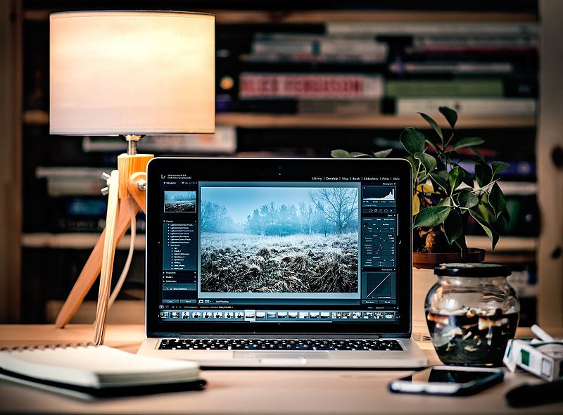 Desk setup with laptop and notes symbolises Northstar’s structured, secure IT Support Bristol, designed for clarity and control.
