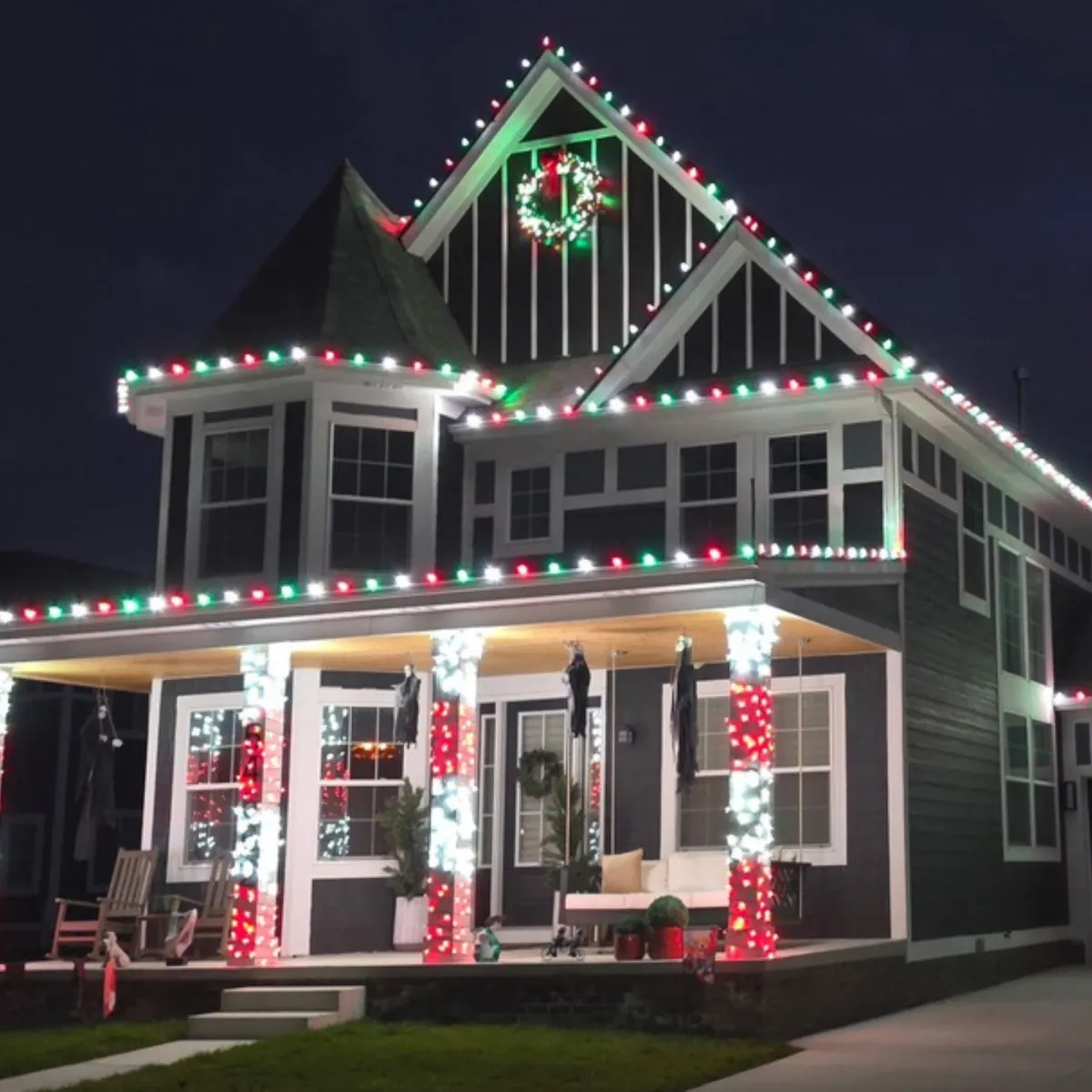 Roofline Christmas light installation with C9 LEDs on home in Sterling Heights, MI